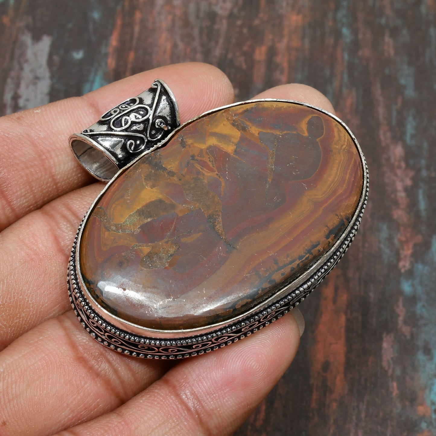 Terra’s Embrace – Antique Silver Agate Pendant