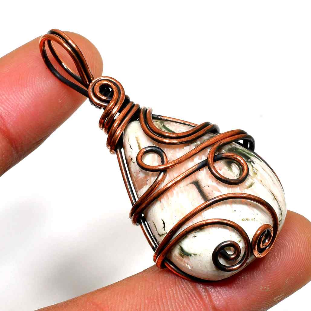 Earth’s Embrace – Copper-Wrapped Stone Pendant