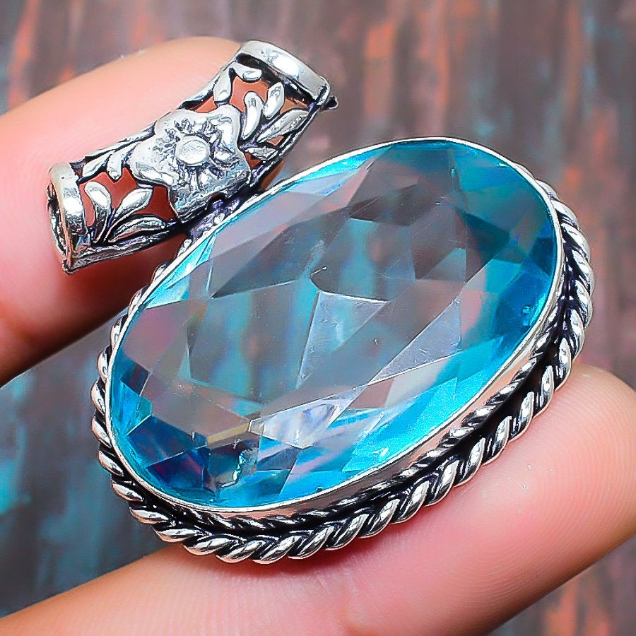 Ocean Whisper – Blue Topaz Sterling Silver Pendant