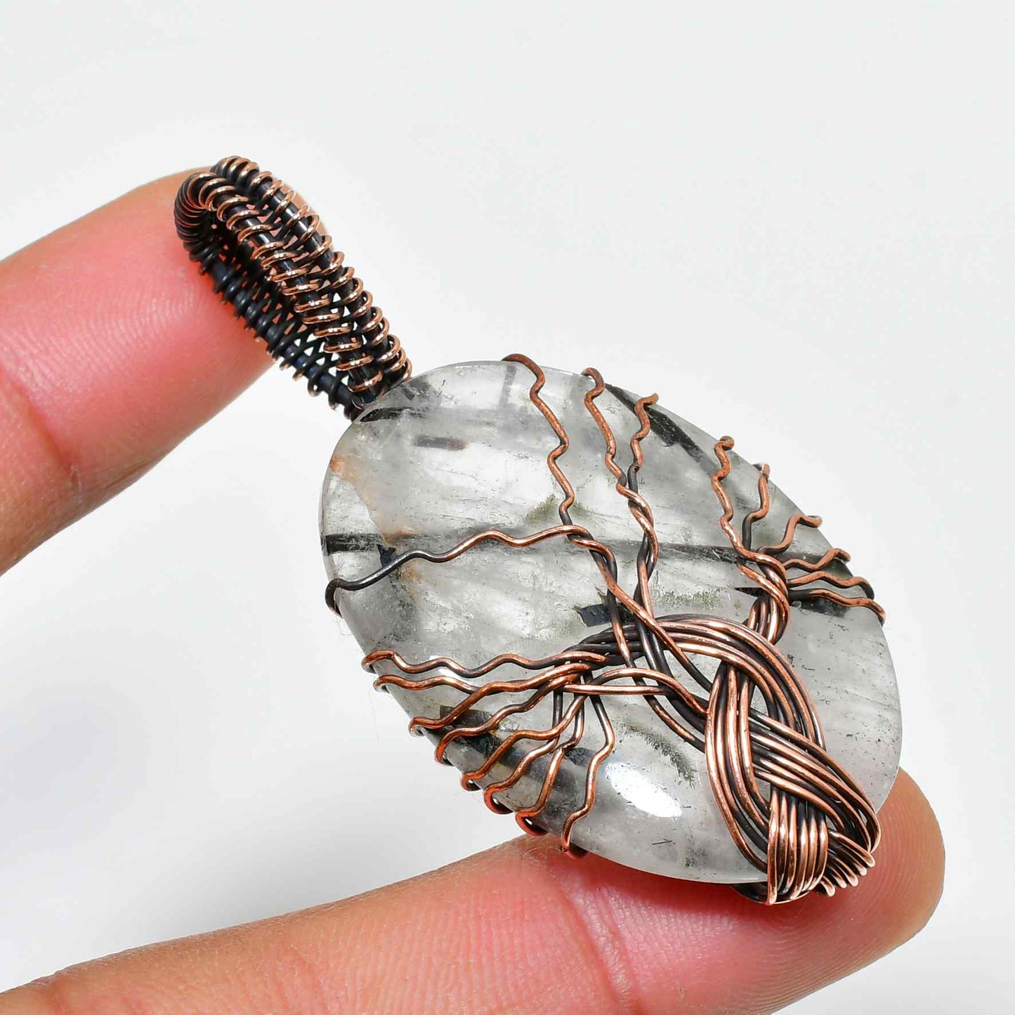 Nature’s Embrace – Copper-Wrapped Quartz Pendant