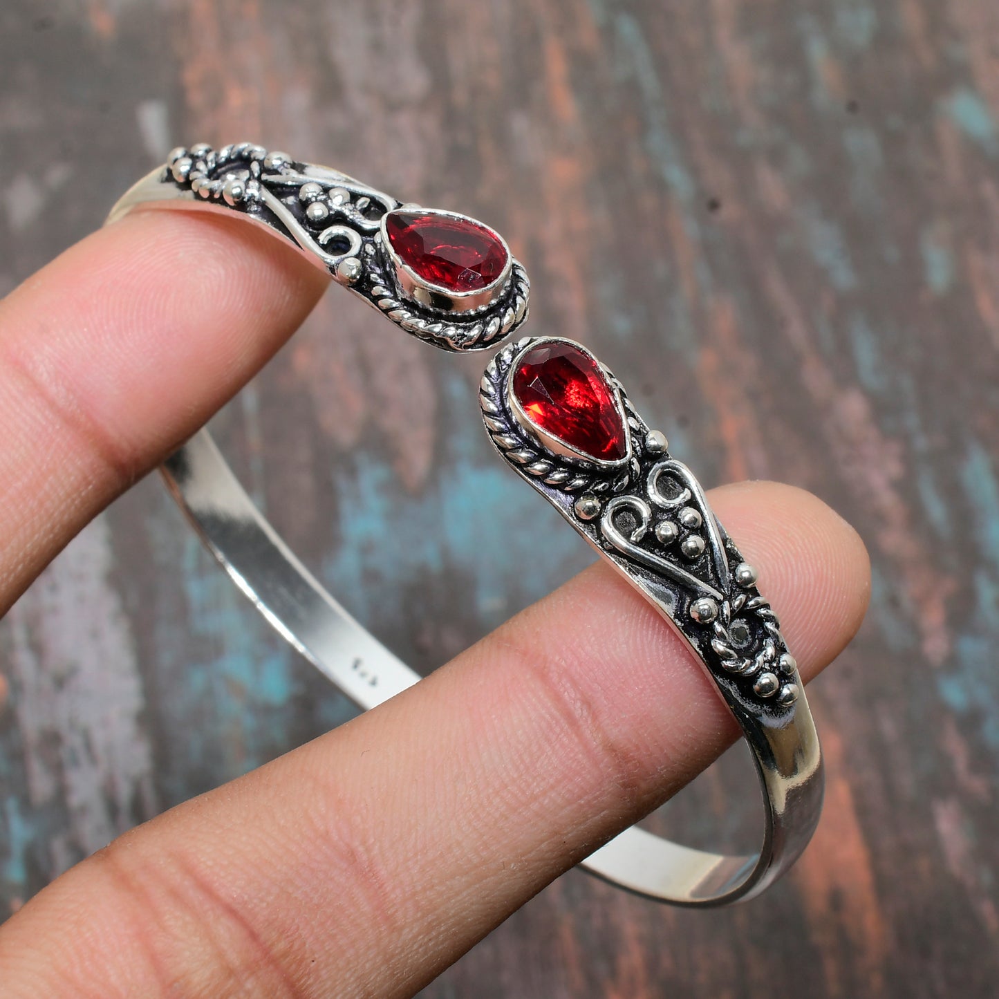 Scarlet Serenade – Ruby Teardrop Silver Bracelet