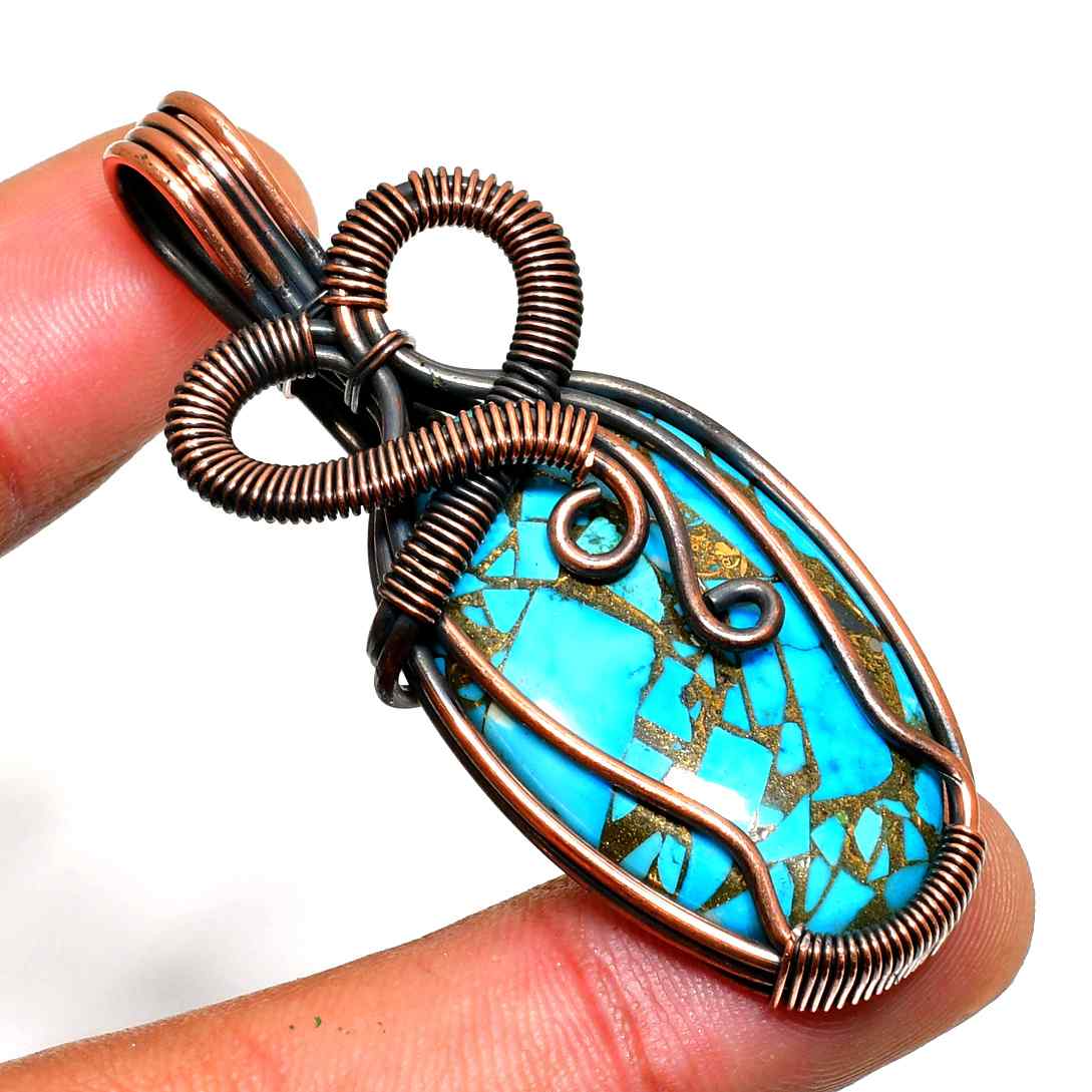 Ocean’s Embrace – Bronze-Wrapped Turquoise Pendant