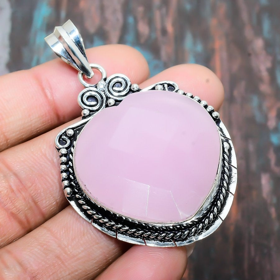 Serenity’s Embrace – Rose Quartz Sterling Silver Pendant