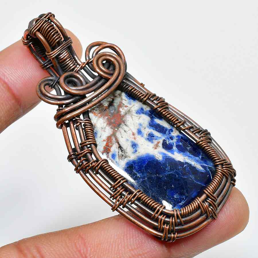 Serenity’s Embrace – Sodalite Copper Pendant