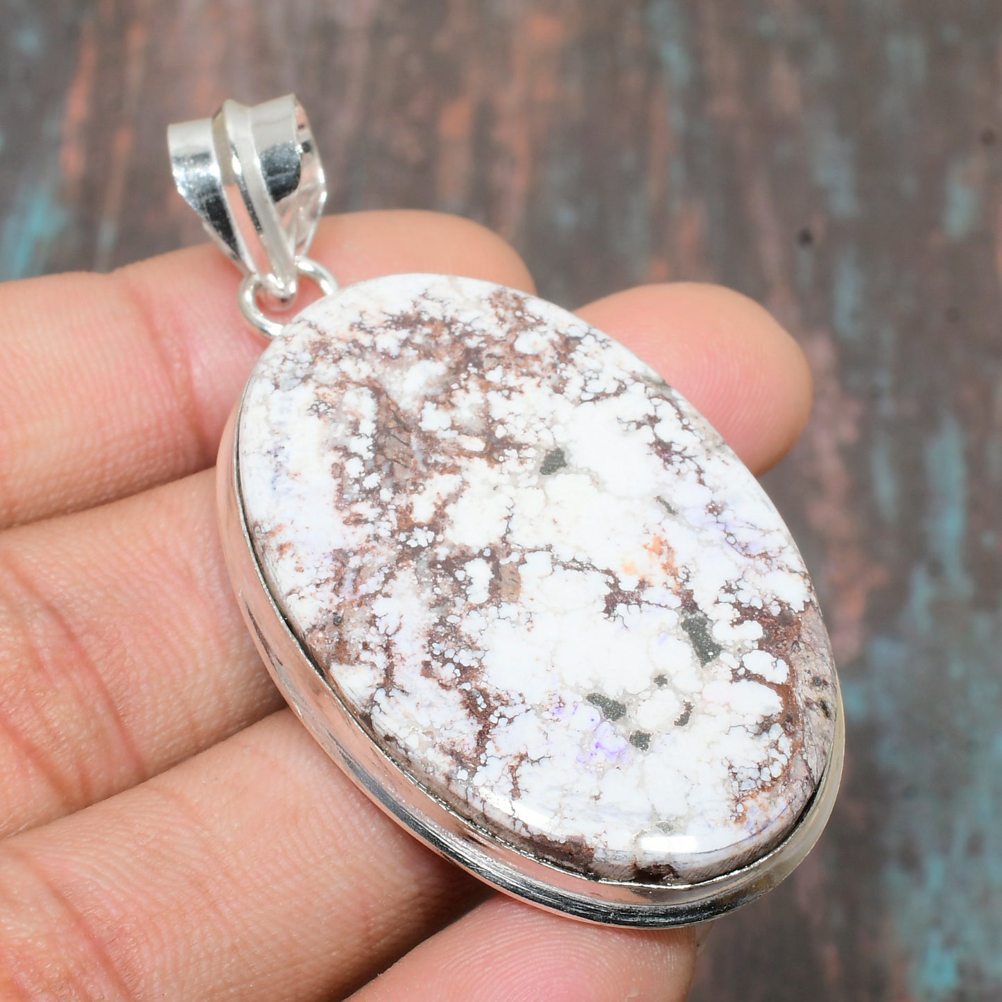 Gaia’s Balance – Snowflake Obsidian & Silver Pendant