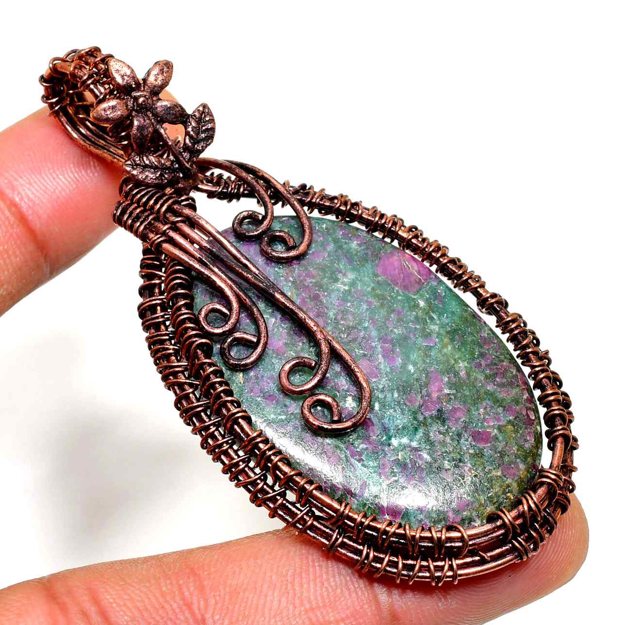 Ember’s Essence – Rhodonite & Oxidized Copper Pendant