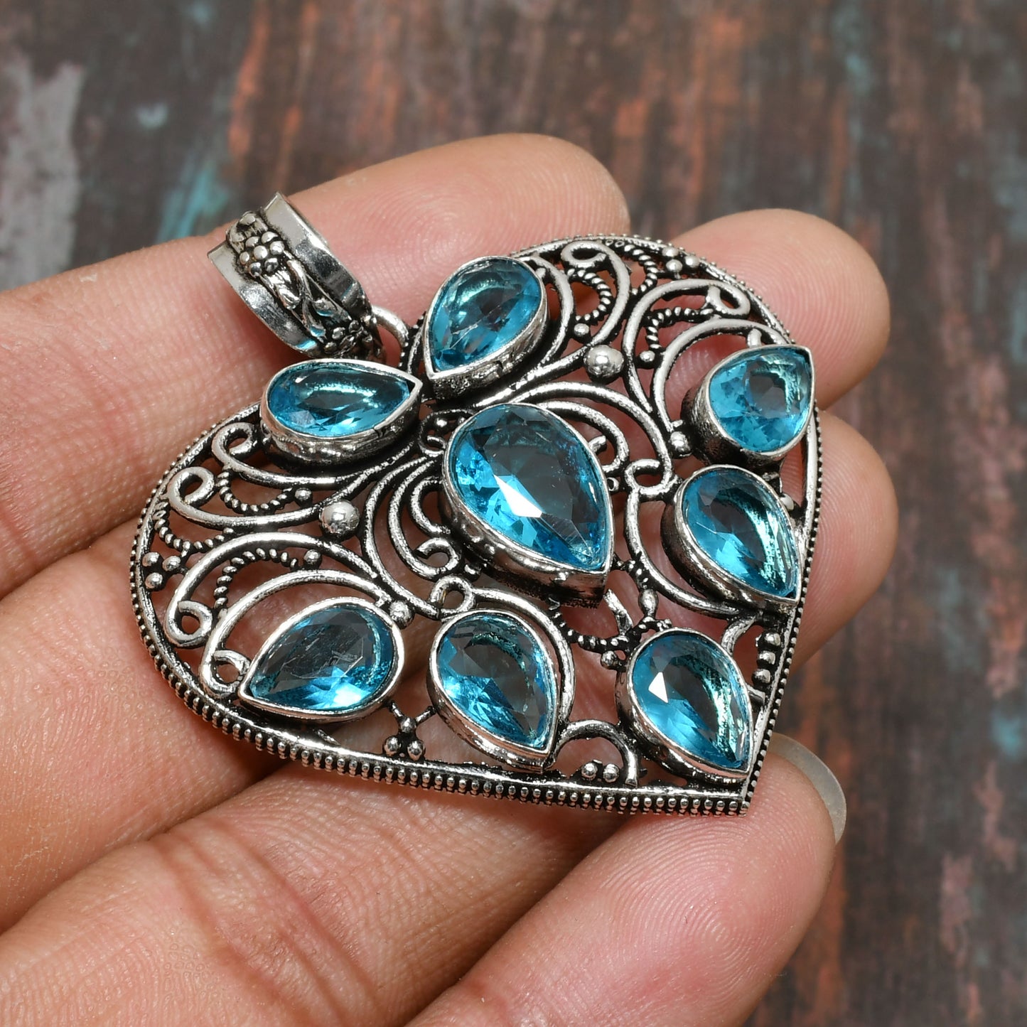 Celestial Heart – Blue Topaz & Antique Silver Filigree Pendant