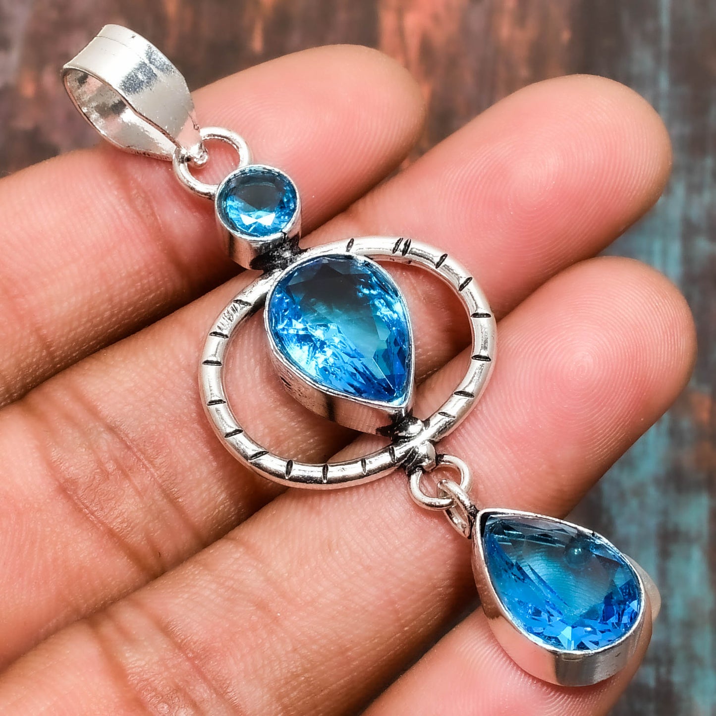 Azure Tranquility – Sterling Silver Blue Topaz Pendant