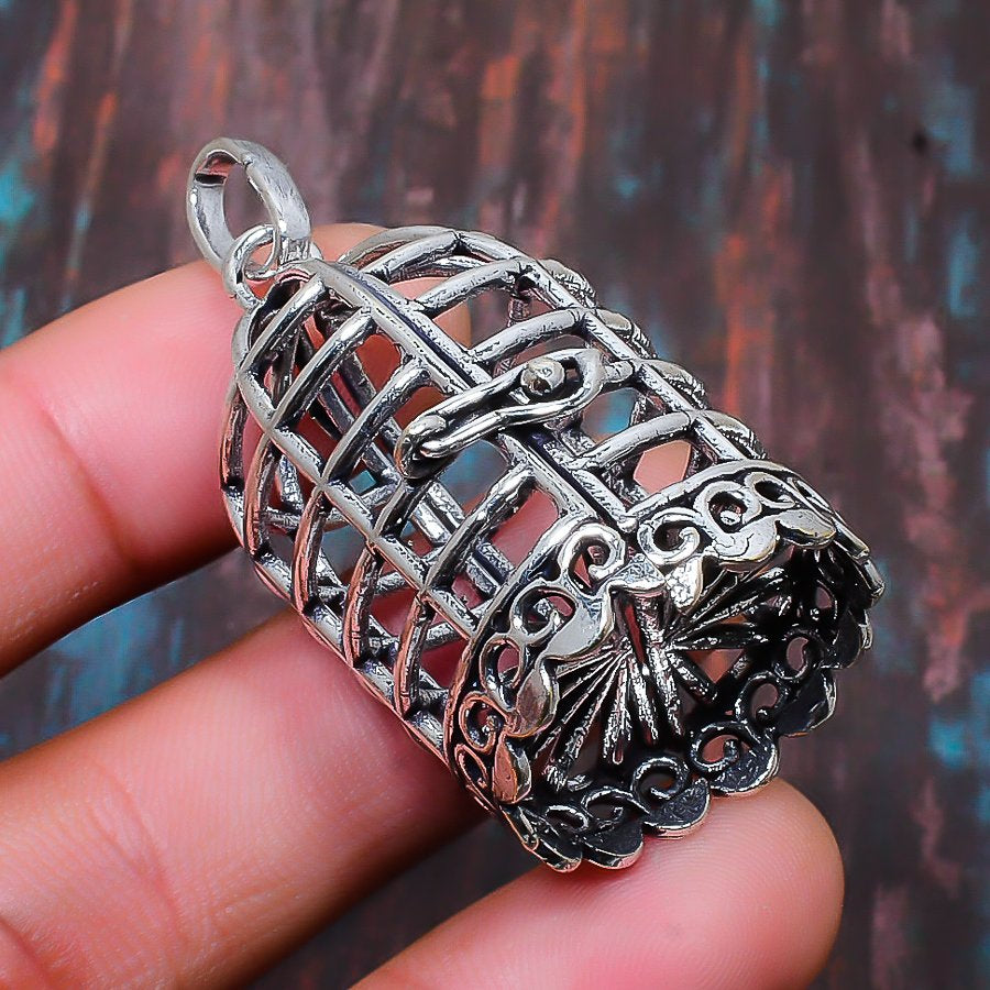 Freedom’s Flight – Sterling Silver Cage Pendant