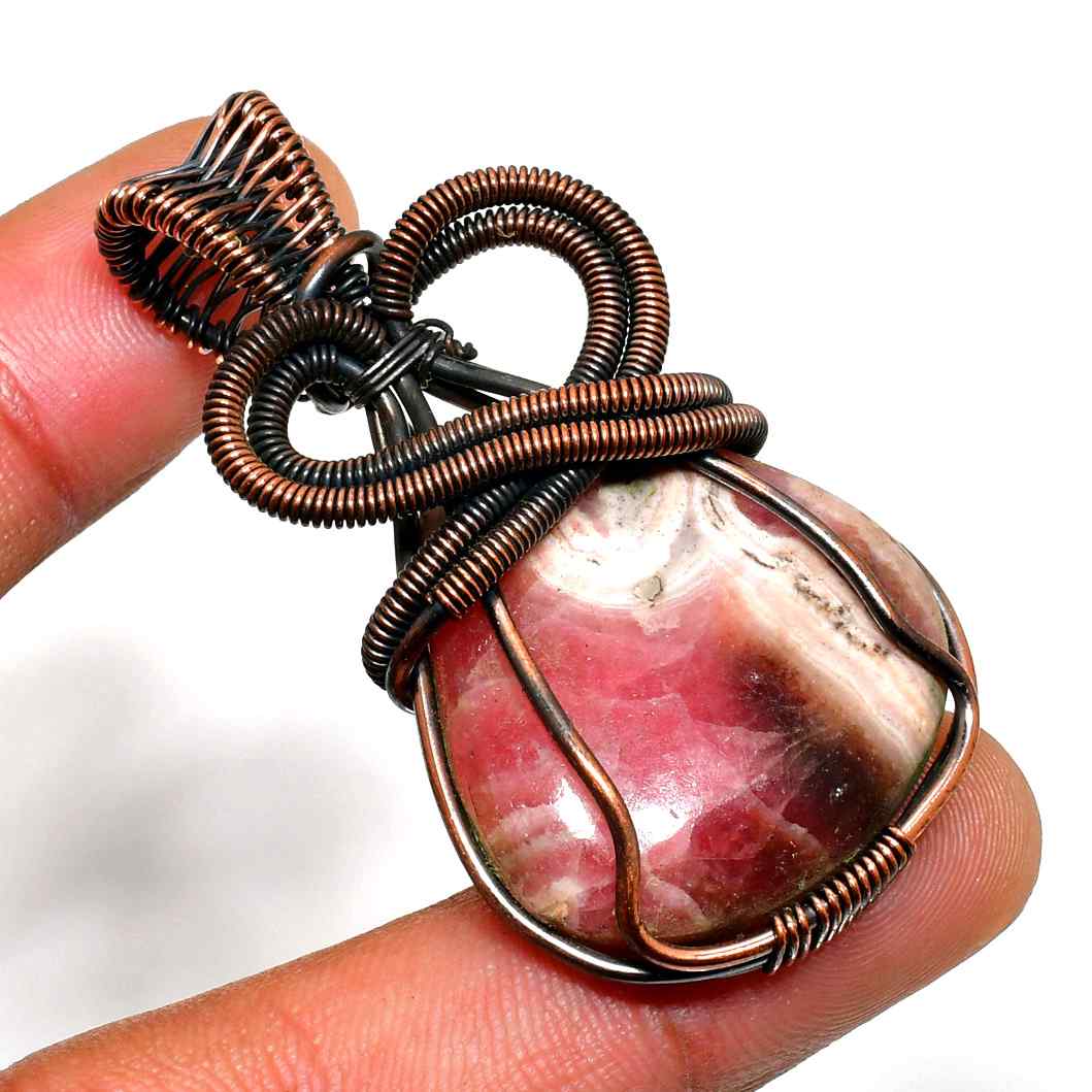 Heart’s Embrace – Rhodonite Copper Pendant