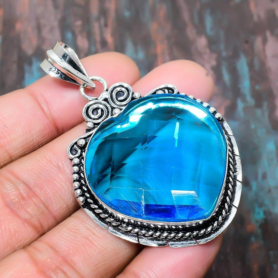 Ocean’s Heart – Blue Topaz Sterling Silver Pendant