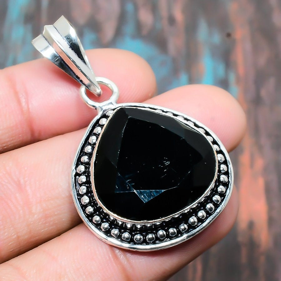 Obsidian’s Embrace – Sterling Silver Shield Pendant