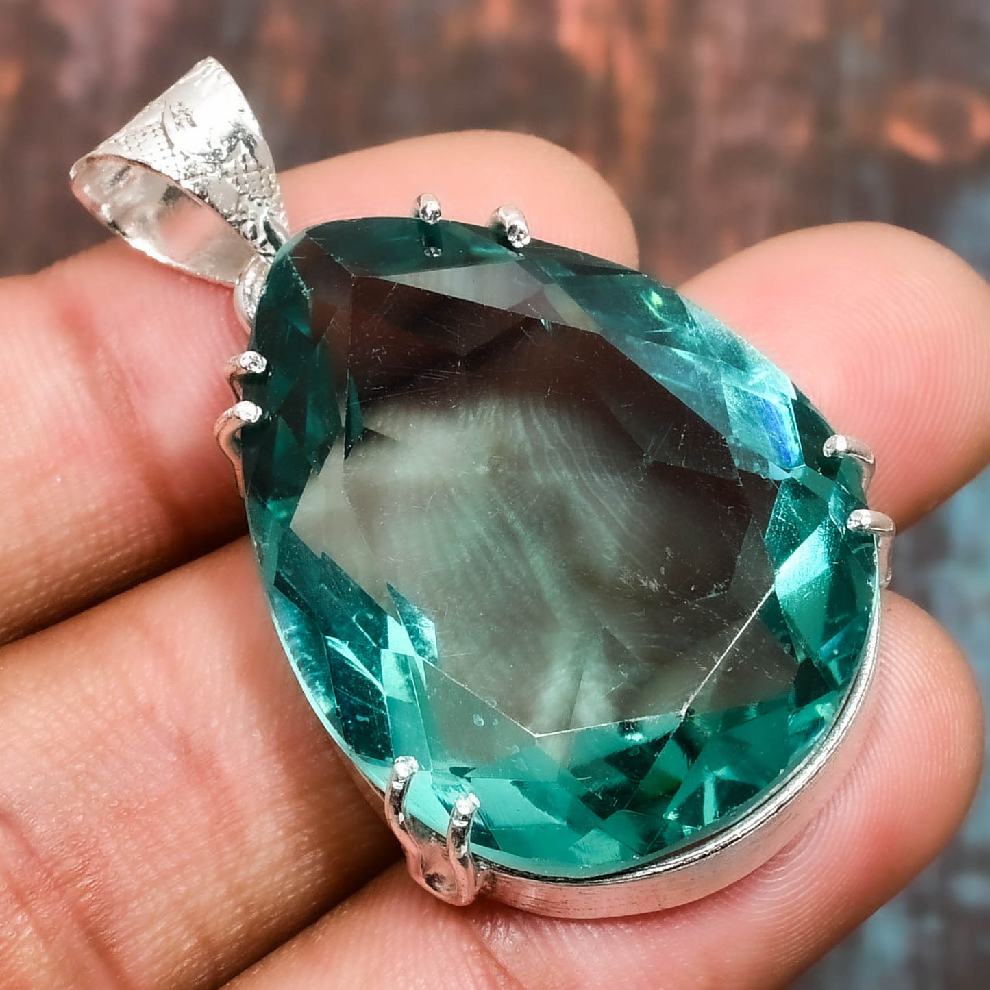 Ocean’s Embrace – Teal Aura Quartz Silver Pendant