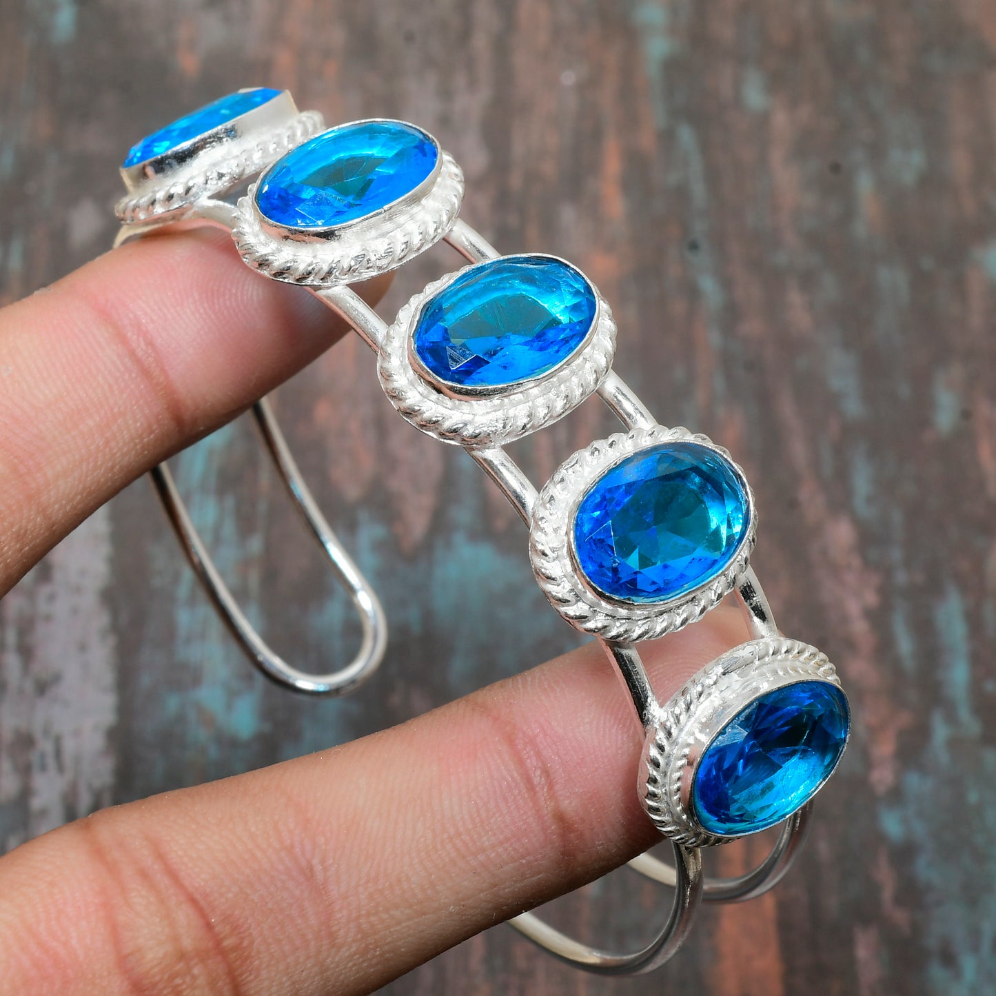 Ocean’s Embrace – Blue Topaz Sterling Silver Bracelet