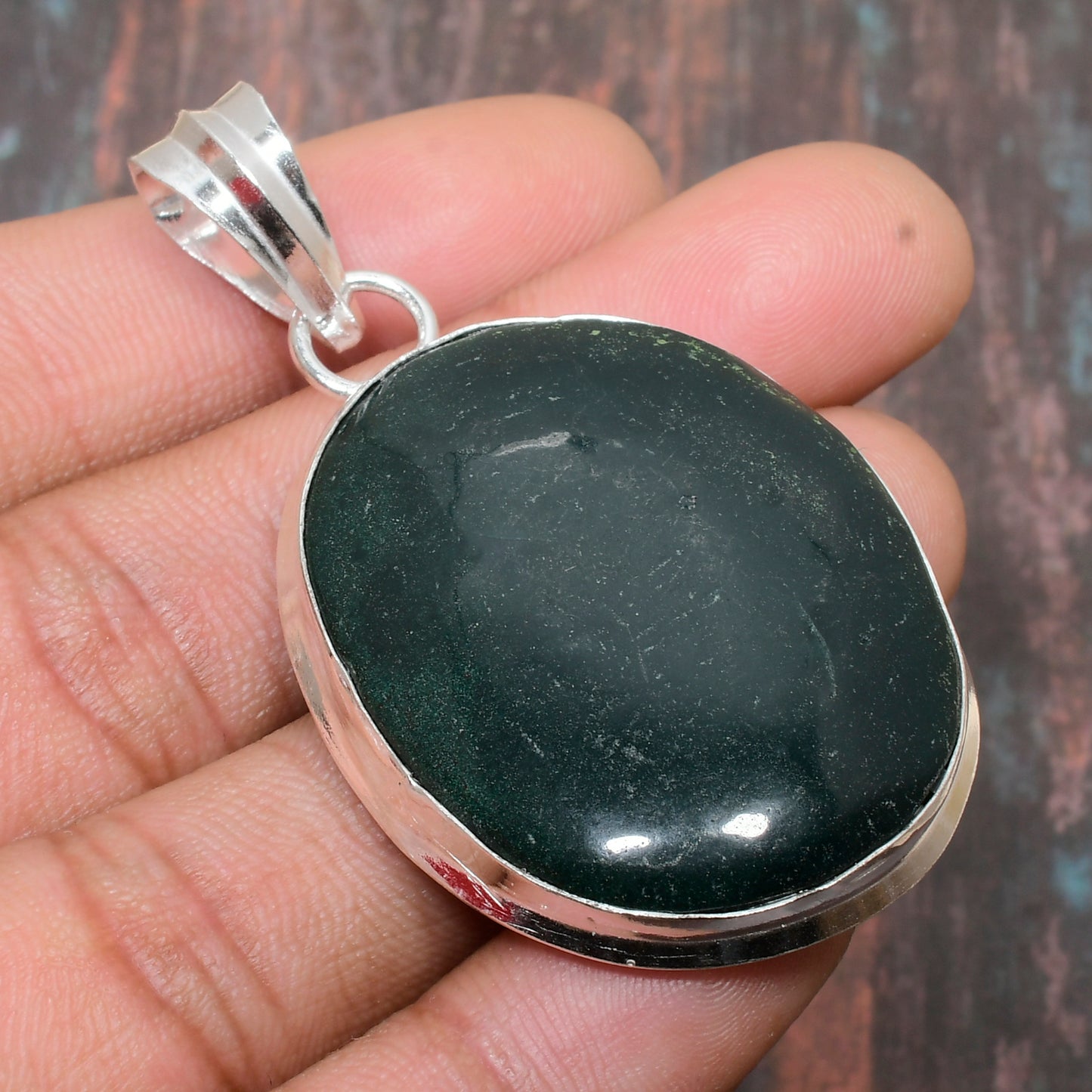 Serenity’s Embrace – Green Jade & Sterling Silver Pendant