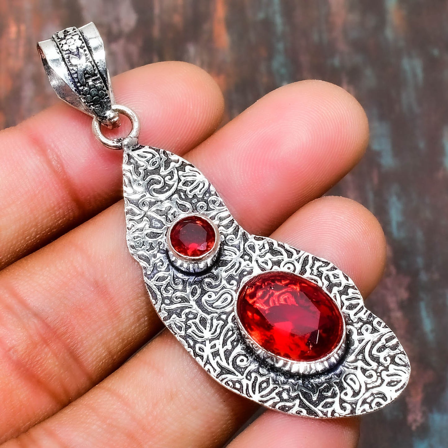 Ember’s Kiss – Sterling Silver Garnet Pendant