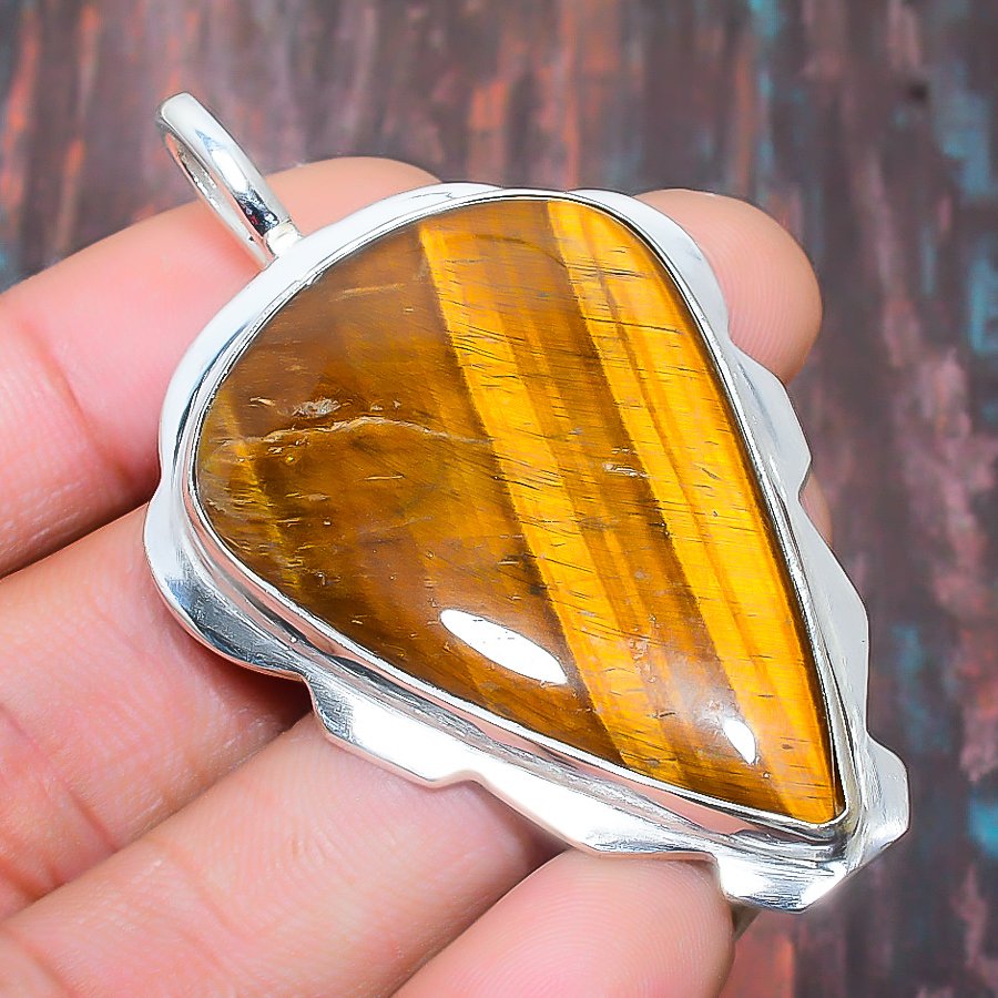 Solar Sentinel – Tiger’s Eye Sterling Silver Pendant