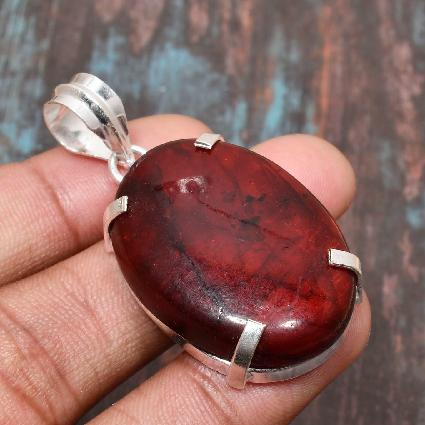 Ember’s Embrace – Garnet Silver Pendant