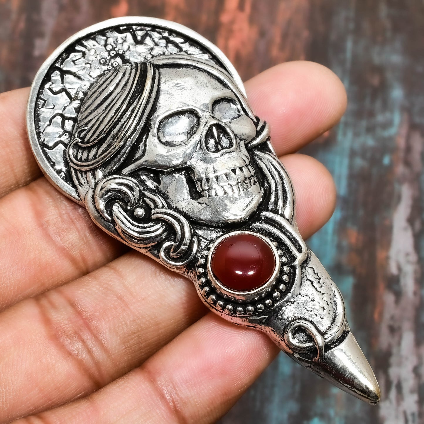 Crimson Requiem – Carnelian Skull Pendant
