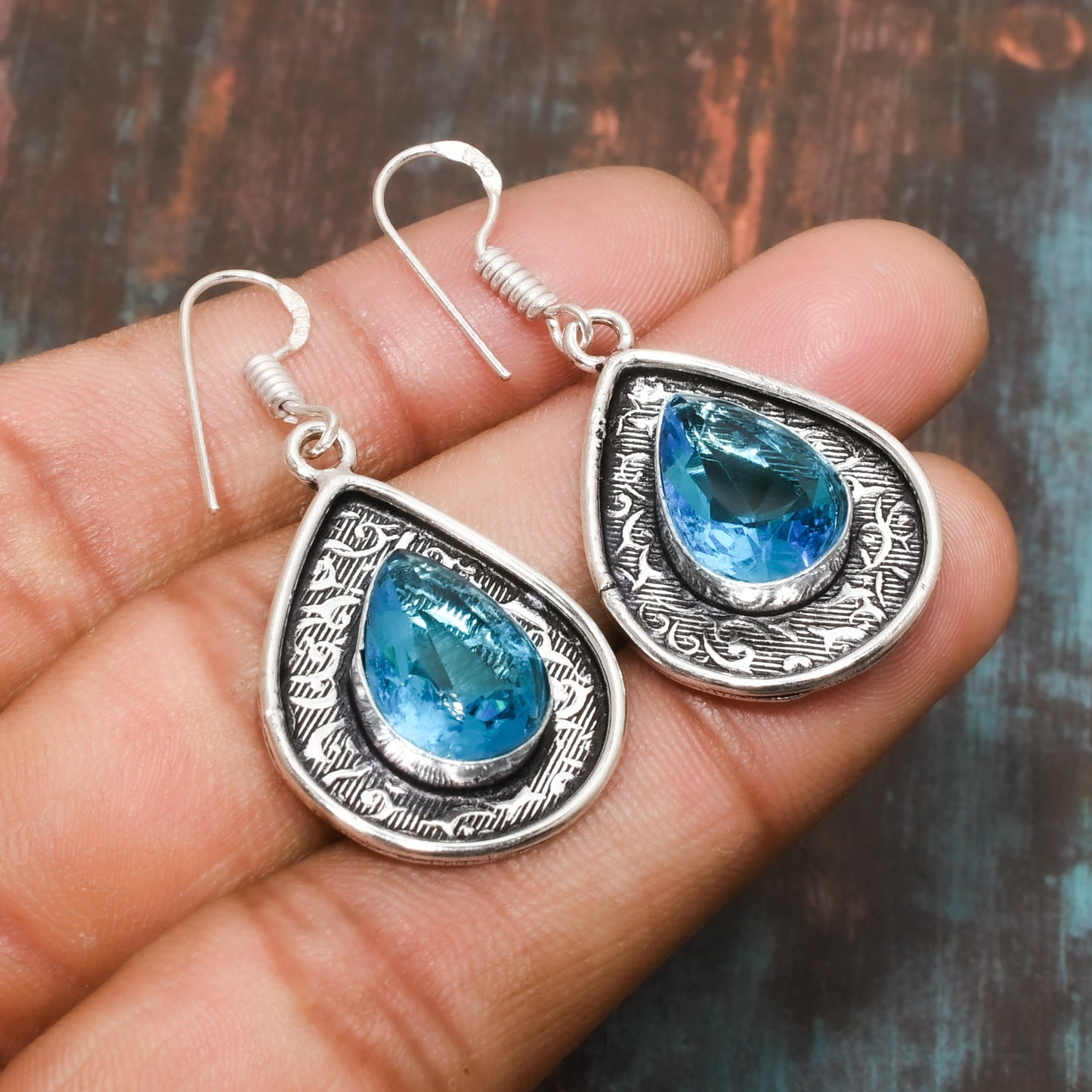 Ocean’s Whisper – Blue Topaz Sterling Silver Teardrop Earrings