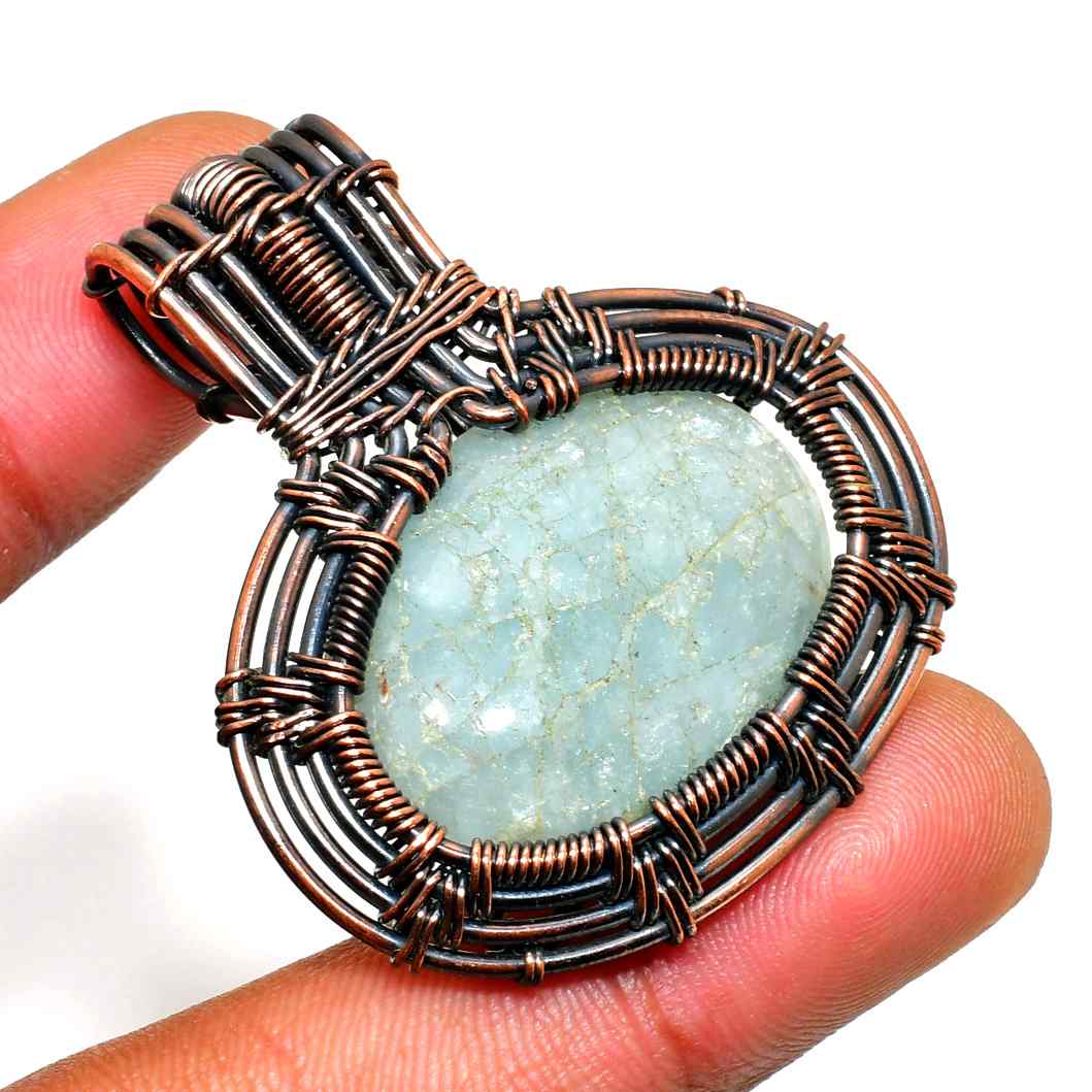Ocean’s Embrace – Aquamarine Copper Pendant