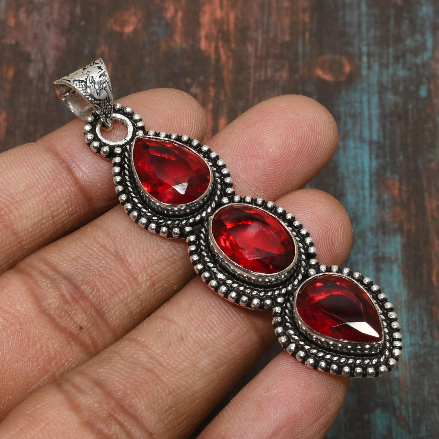 Radiant Ember – Triple Garnet & Silver Pendant