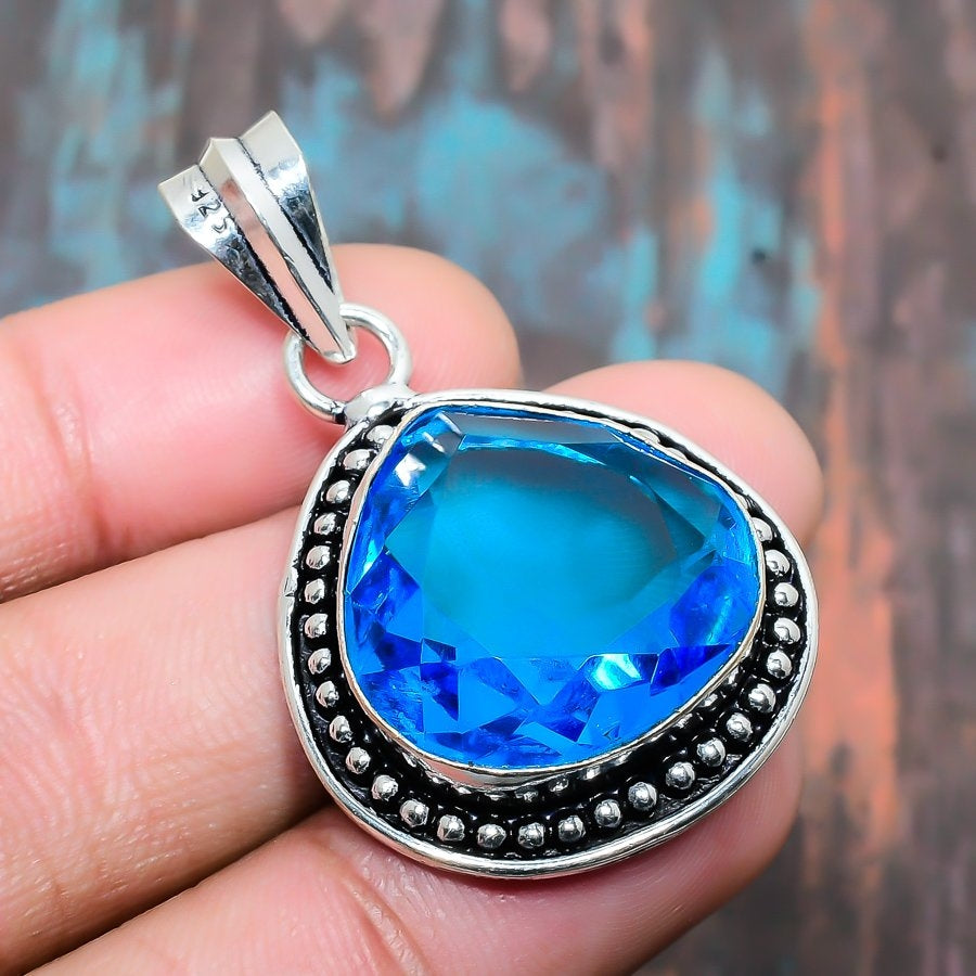 Azure Radiance – Blue Topaz Sterling Silver Pendant