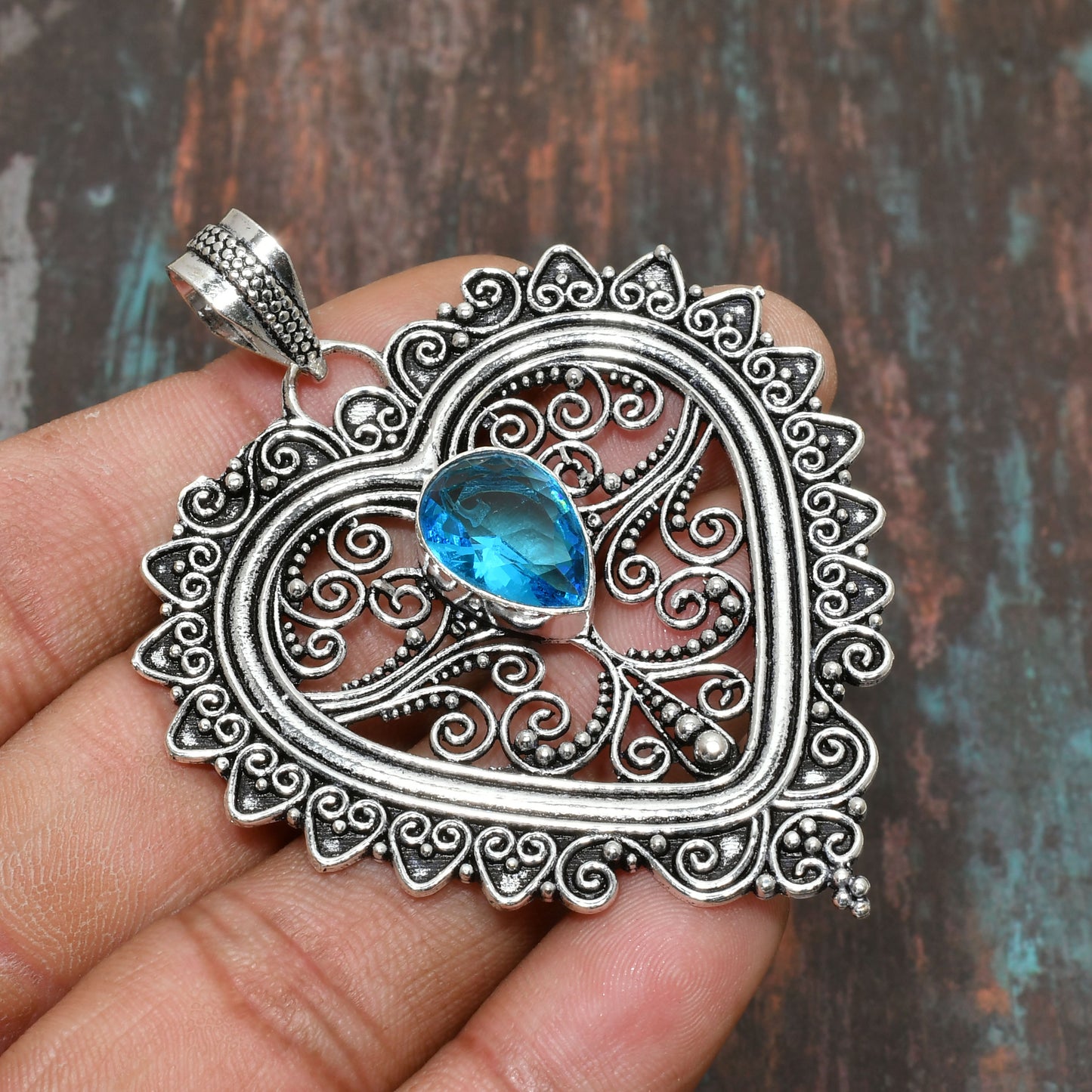 Ocean’s Heart – Blue Topaz Sterling Silver Filigree Pendant