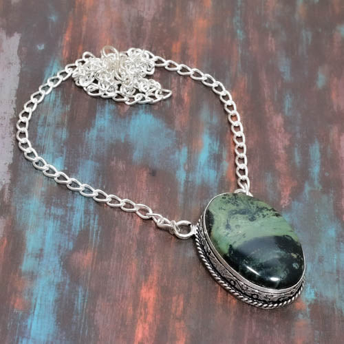 Gaia’s Embrace – Greenstone & Sterling Silver Pendant
