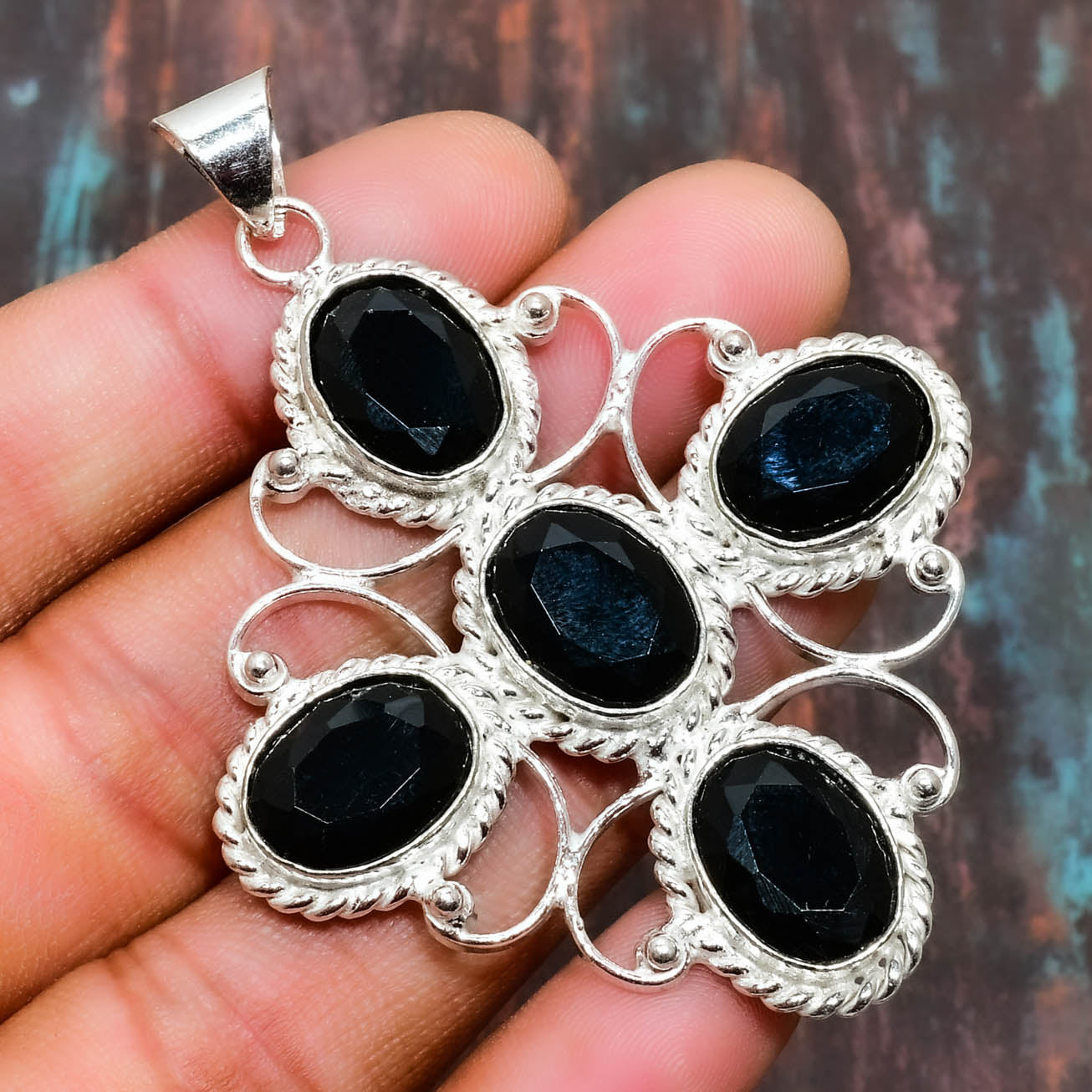 Seraph’s Embrace – Black Onyx Sterling Silver Pendant