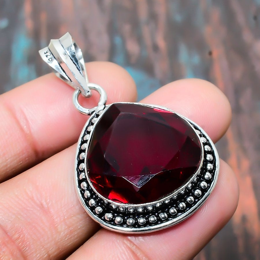 Ember’s Embrace – Garnet Sterling Silver Pendant