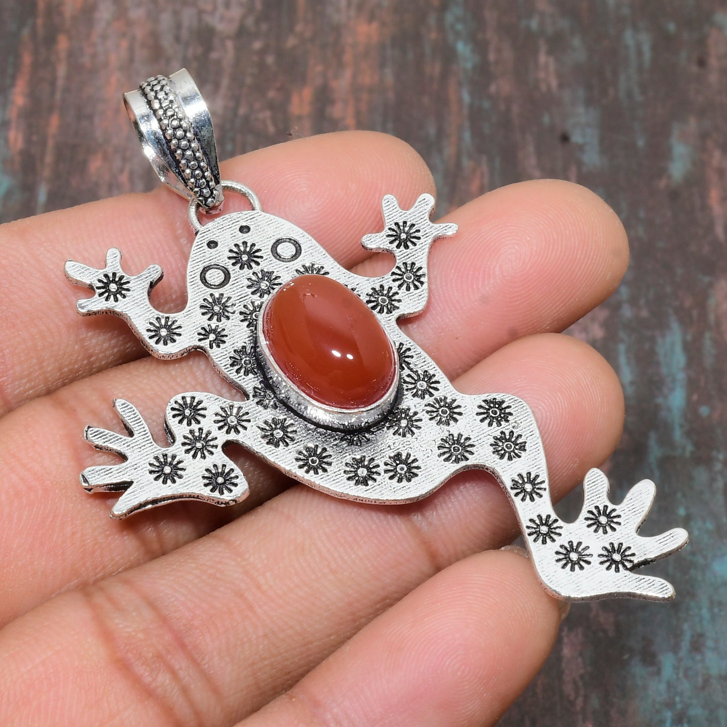 Ember Leap – Carnelian Frog Pendant