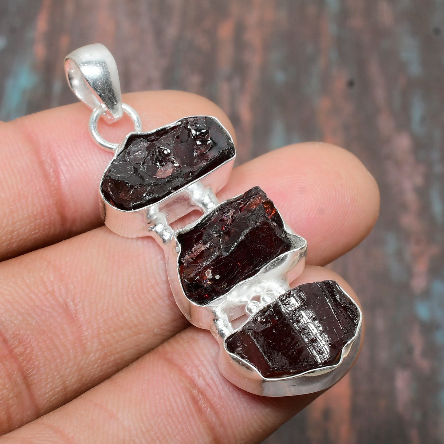 Ember’s Embrace – Sterling Silver Garnet Pendant