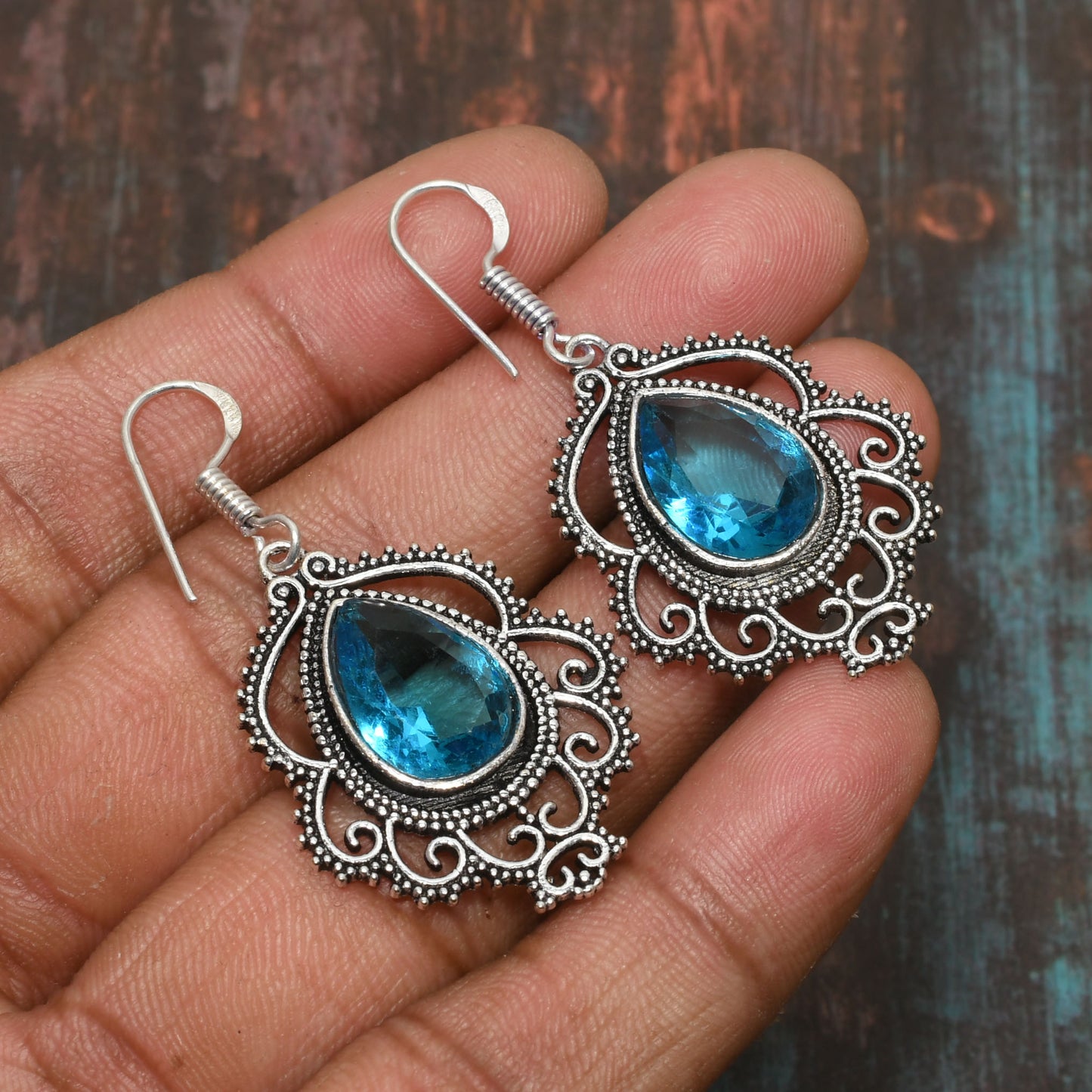 Ocean’s Embrace – Blue Topaz Filigree Earrings