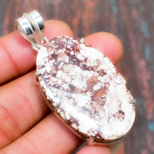 Earthbound Elegance – Owensite Sterling Silver Pendant