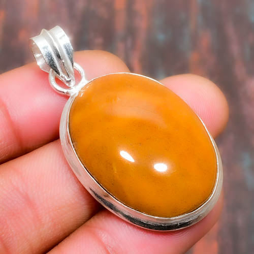 Gaia’s Glow – Amber & Sterling Silver Pendant