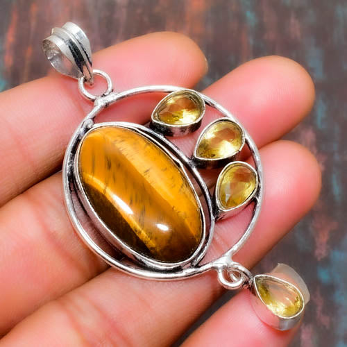 Valor’s Flame – Tiger’s Eye Sterling Silver Pendant