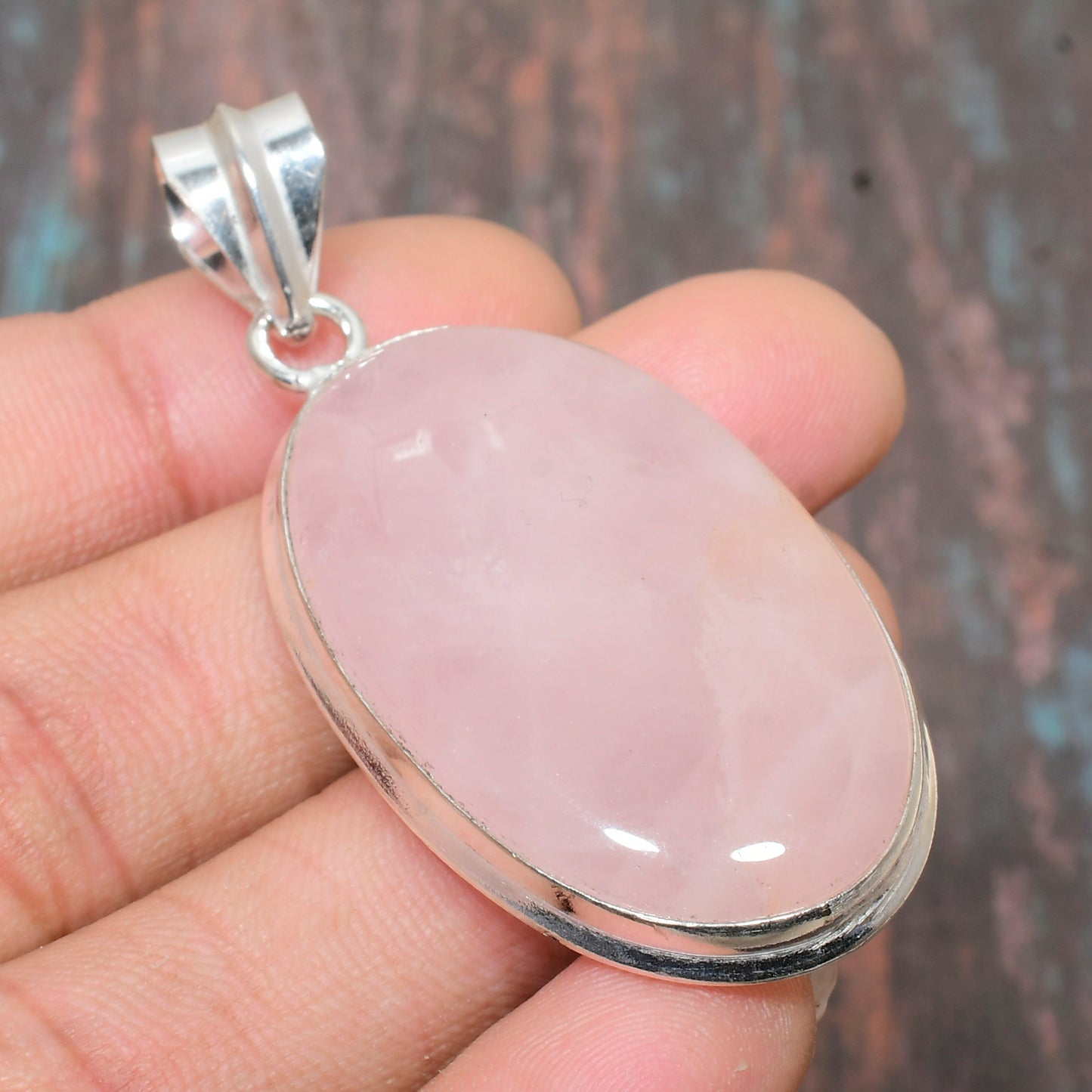 Serenity’s Embrace – Sterling Silver Rose Quartz Pendant