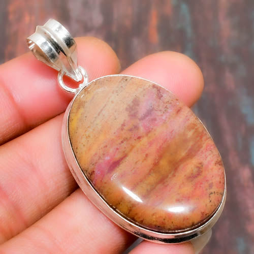 Heart’s Embrace – Rhodochrosite Silver Pendant