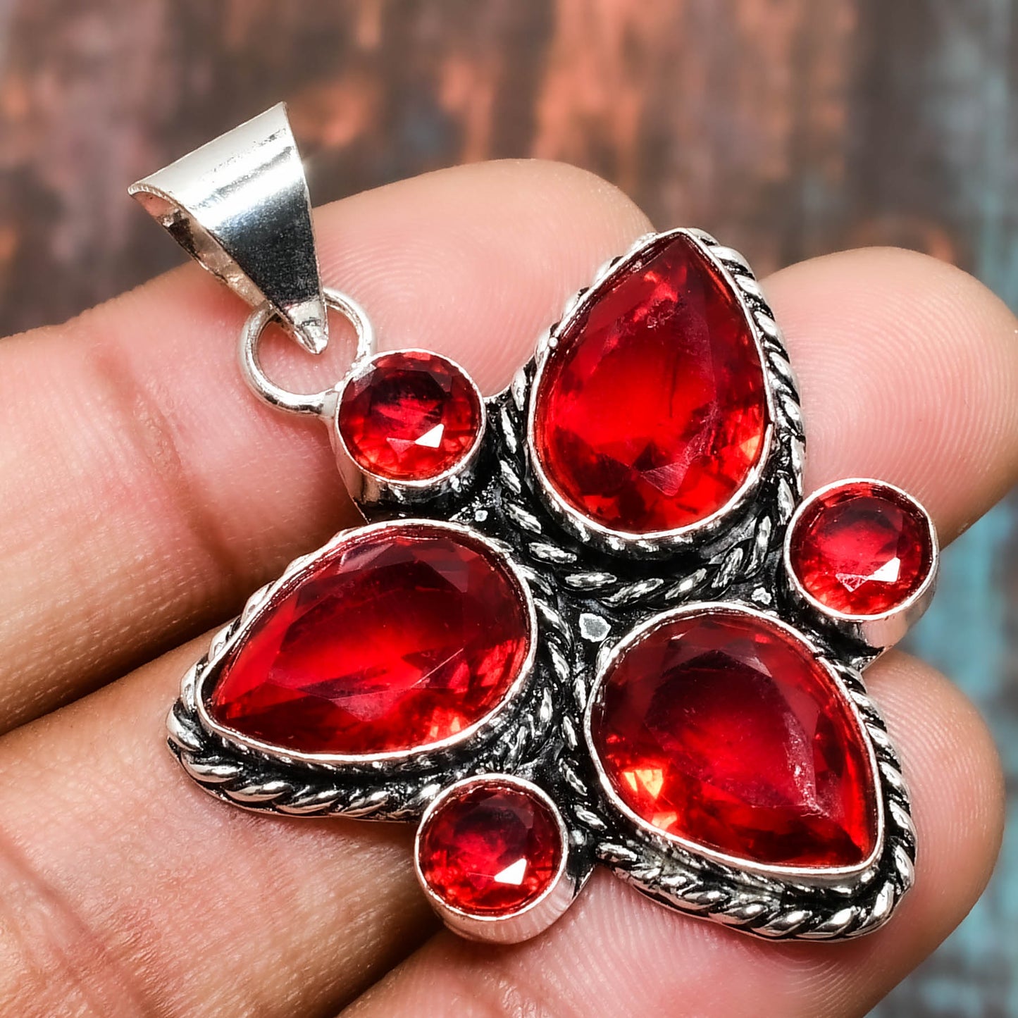 Ember’s Radiance – Red Garnet Sterling Silver Pendant