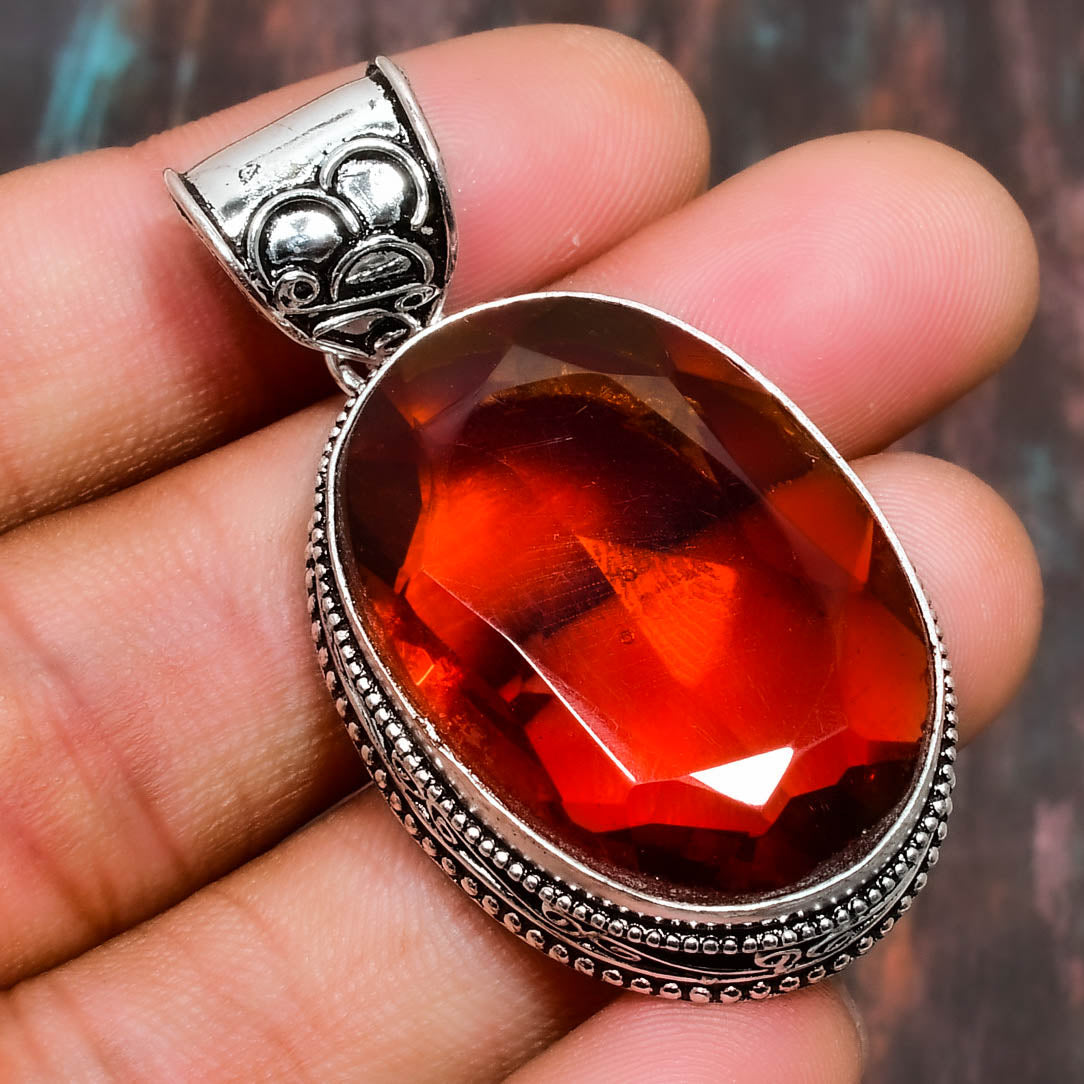 Ember’s Embrace – Garnet Sterling Silver Pendant