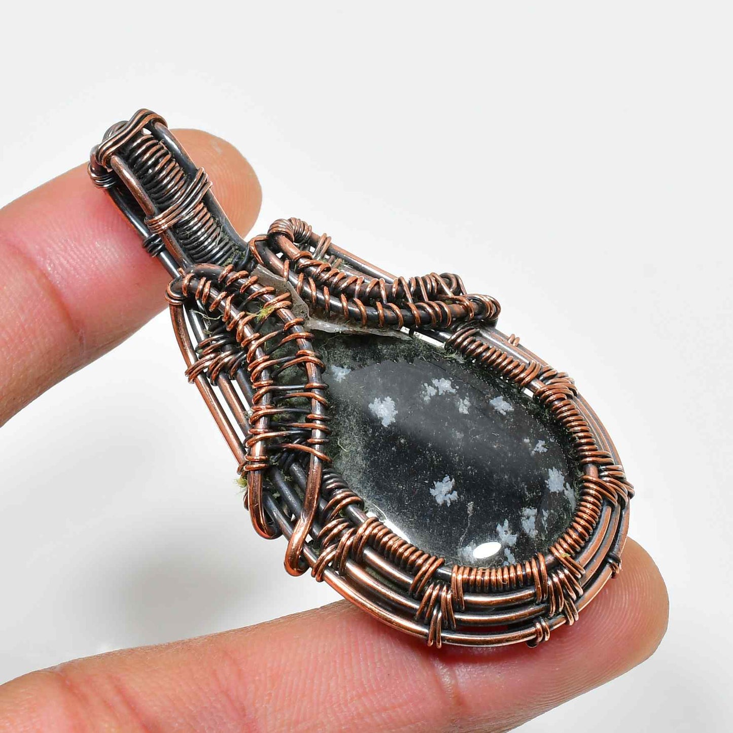 Terra’s Shield – Snowflake Obsidian Copper Pendant