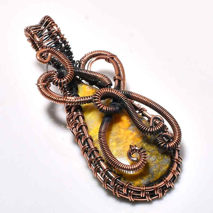 Elara’s Embrace – Yellow Gemstone Copper Pendant