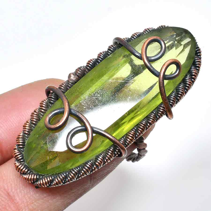 Harmony’s Embrace – Peridot Copper Ring