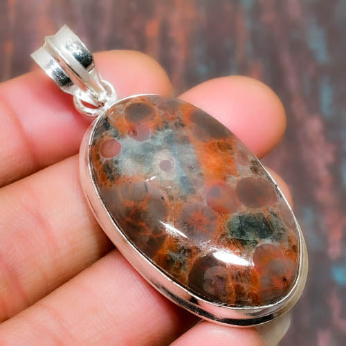 Nature’s Embrace – Plume Agate Sterling Pendant