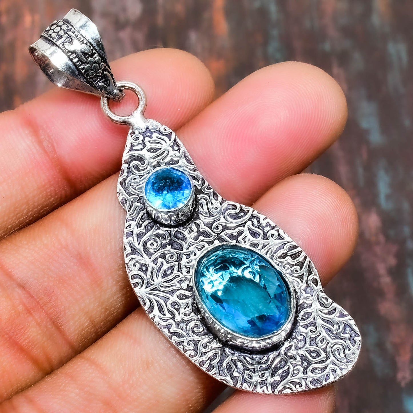 Azure Whisper – Handcrafted Blue Topaz & Sterling Silver Pendant