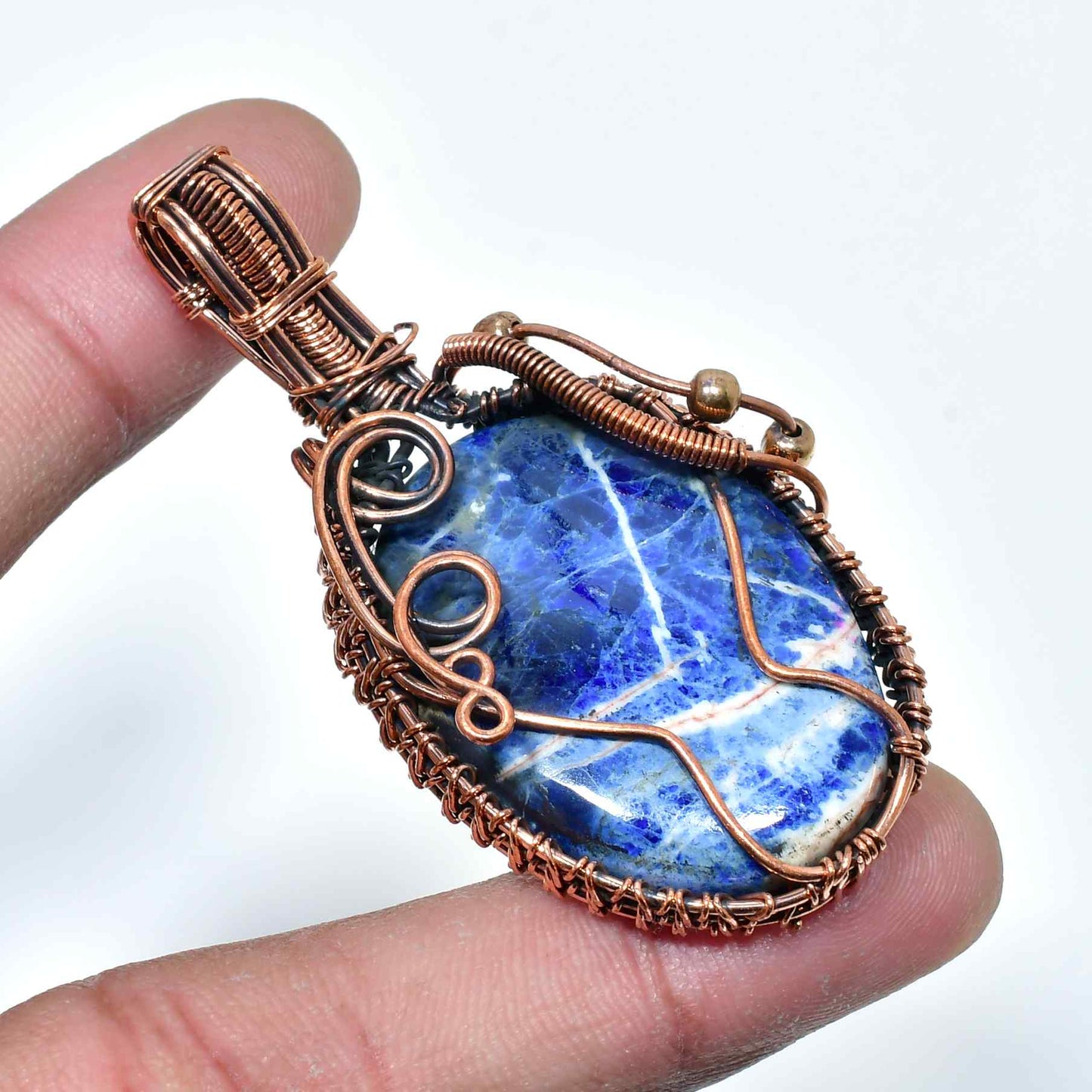Sapphire’s Embrace – Lapis Lazuli Copper Pendant