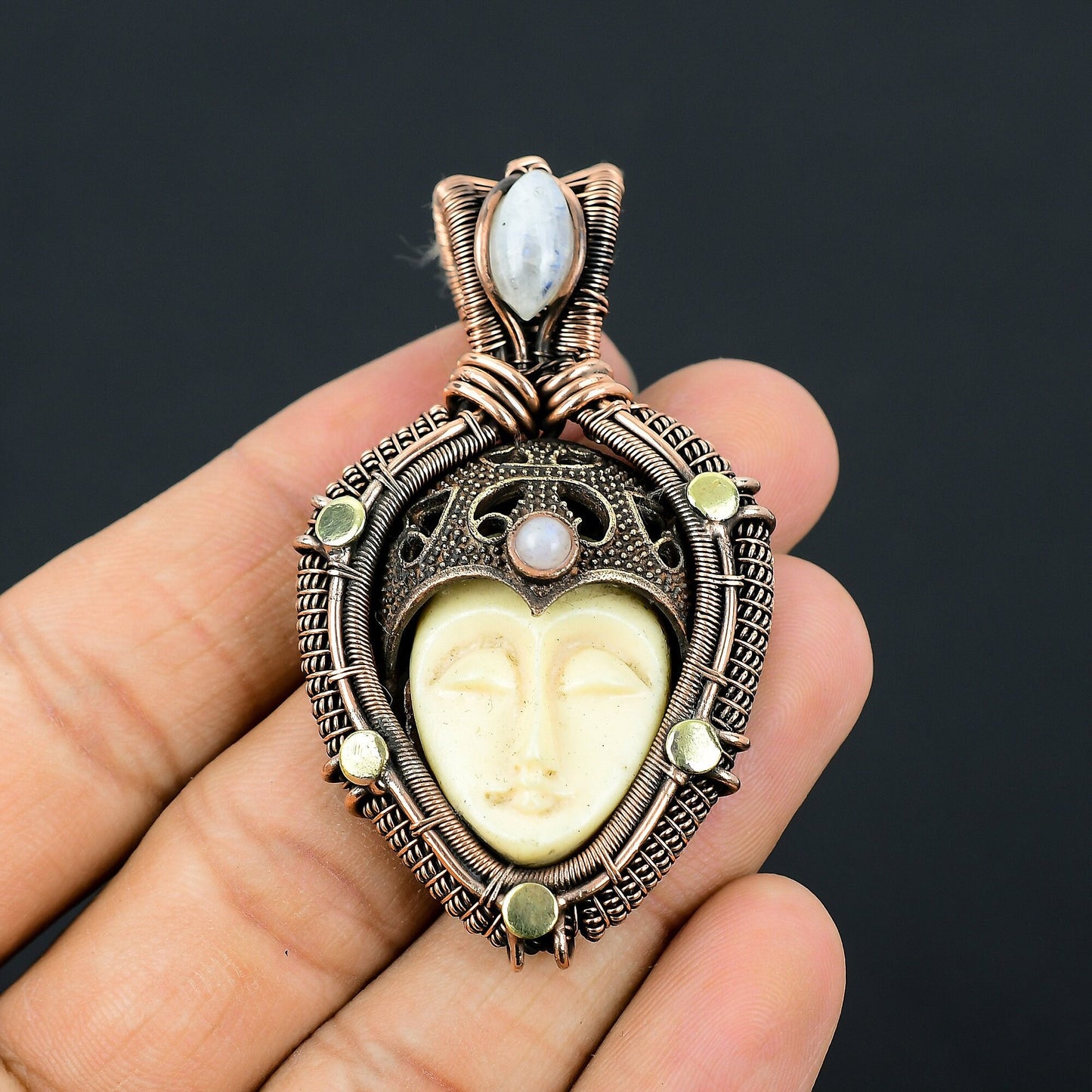 White Carved Bone Face Gemstone Pendant