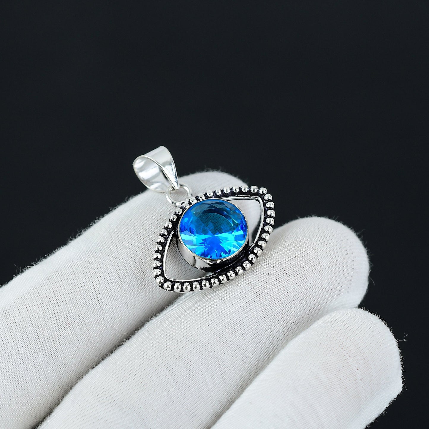 Swiss Blue Topaz Silver Eye Pendant