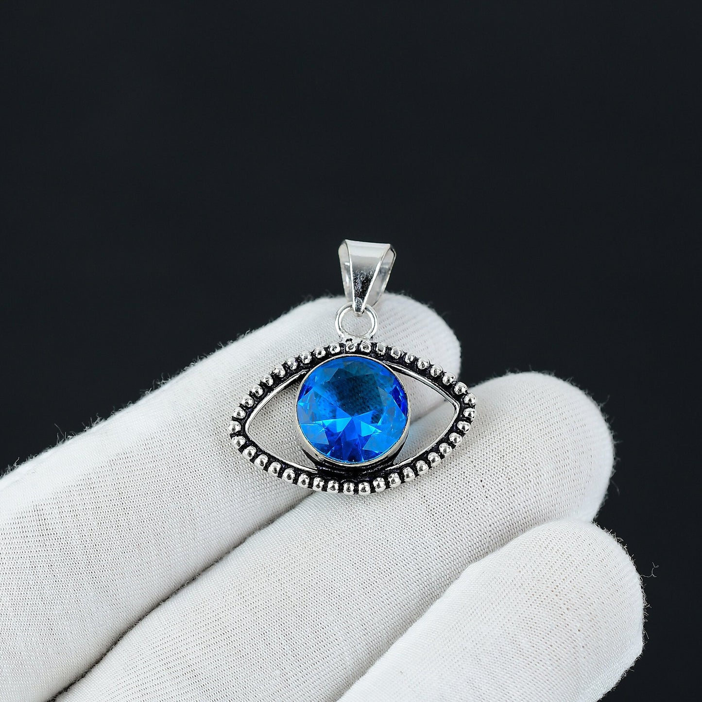 Swiss Blue Topaz Silver Eye Pendant